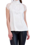 Sleeveless satin tie back turtleneck with lace trim