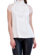 Sleeveless satin tie back turtleneck with lace trim